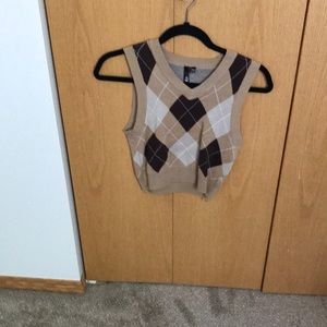 Garage sweater vest